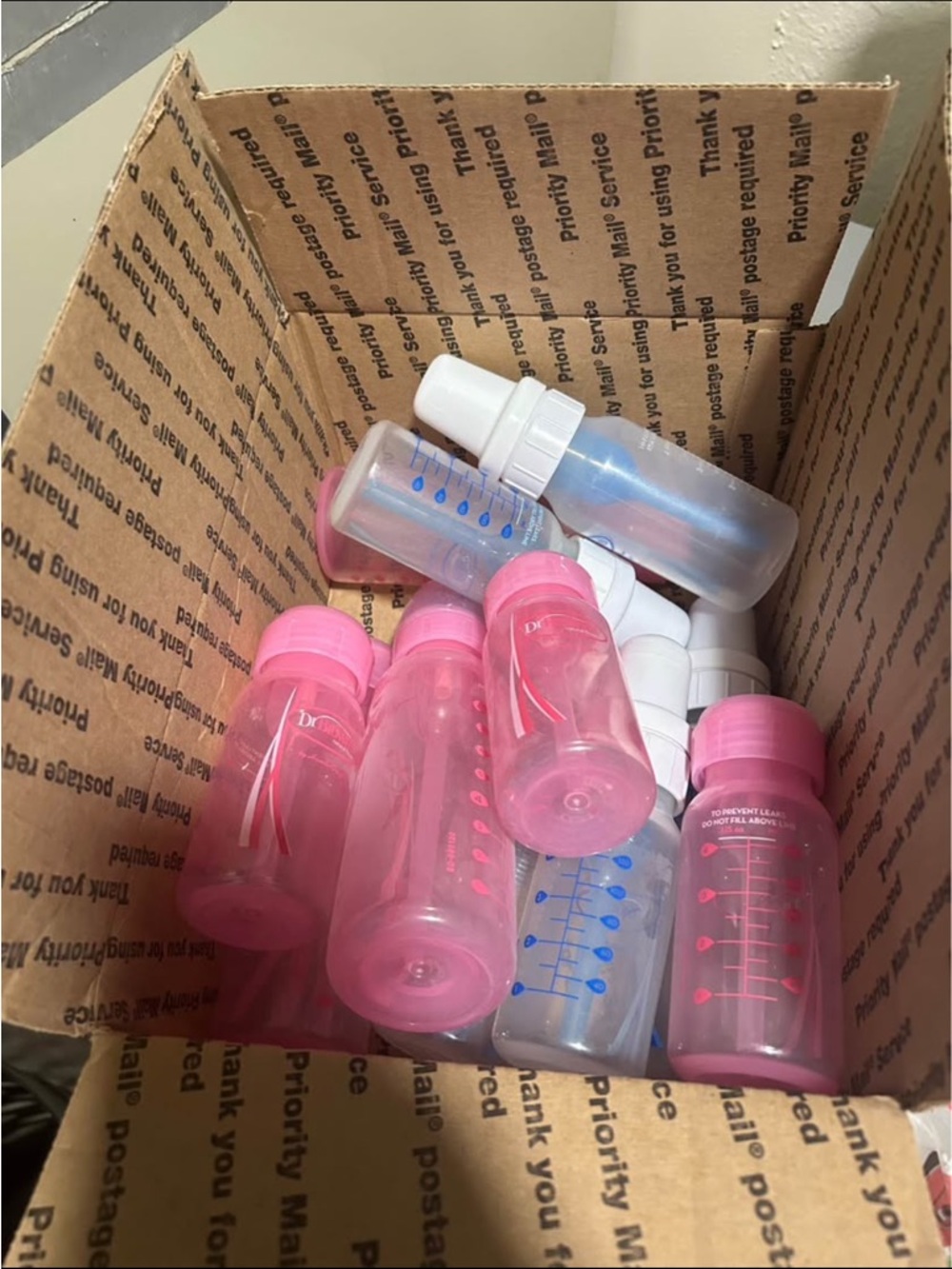 Dr. Browns Pink & Clear Feeding Bottles With All Nipple Sizes